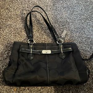 Black coach handbag.